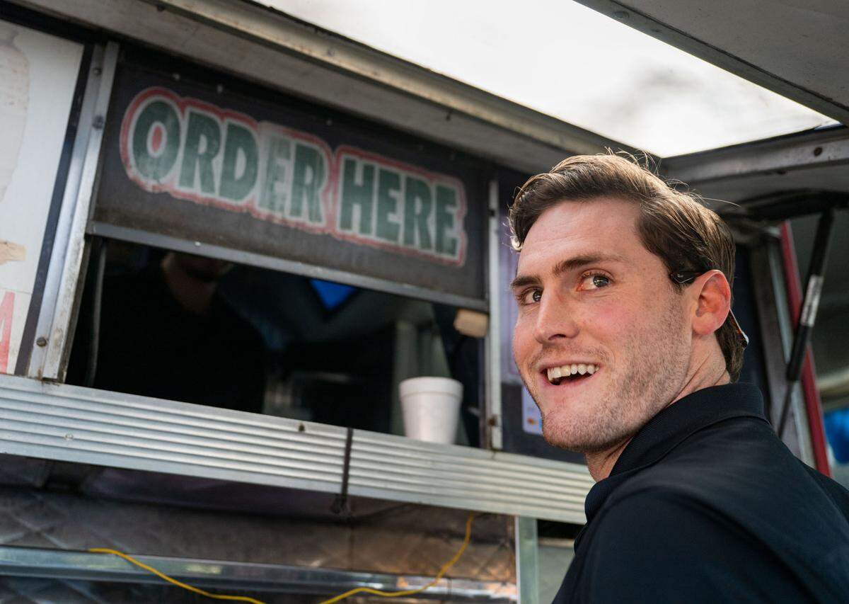 TikTok star Ivan Martinez orders in Spanish from the Tacos La Piedad food truck in Sacramento on May 9.
