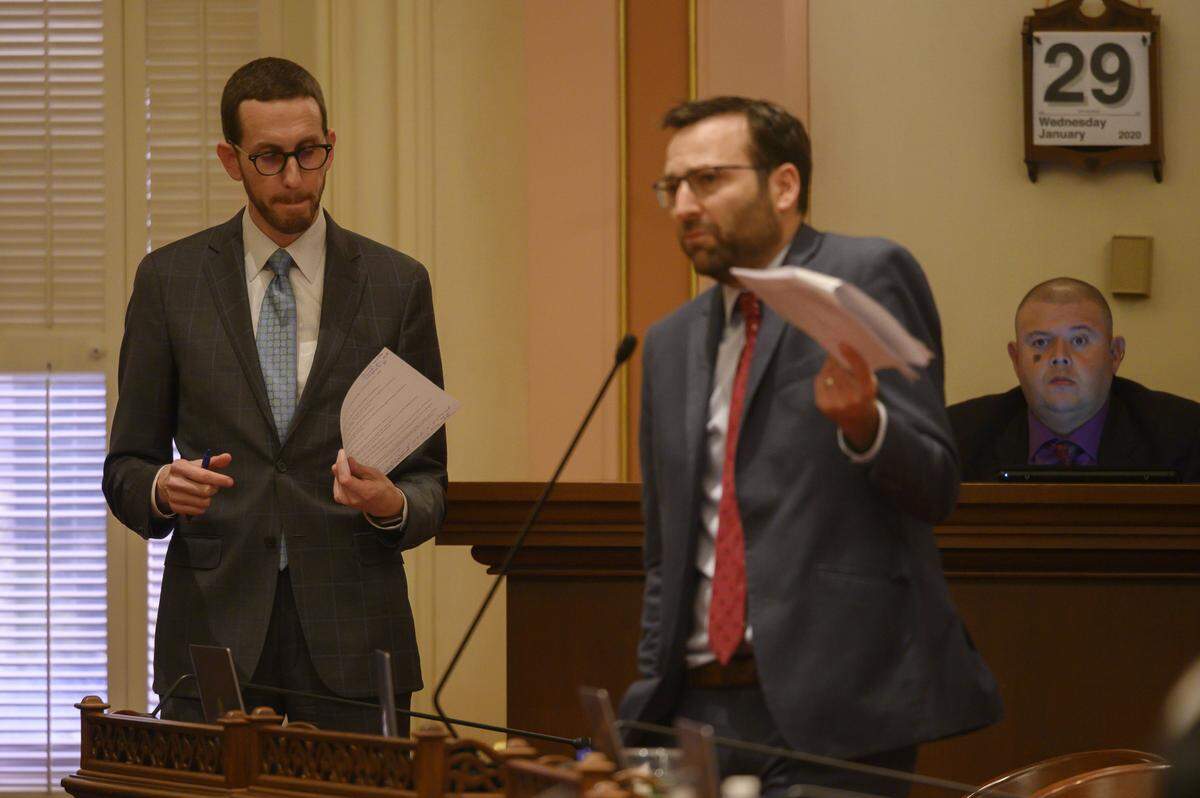 Senate Bill 50 author Scott Weiner, D-San Francisco, left, reacts as Sen. Ben Allen of Santa Monica, right, speaks against SB 50 at the state Capitol on Wednesday, Jan. 29, 2020, in Sacramento.