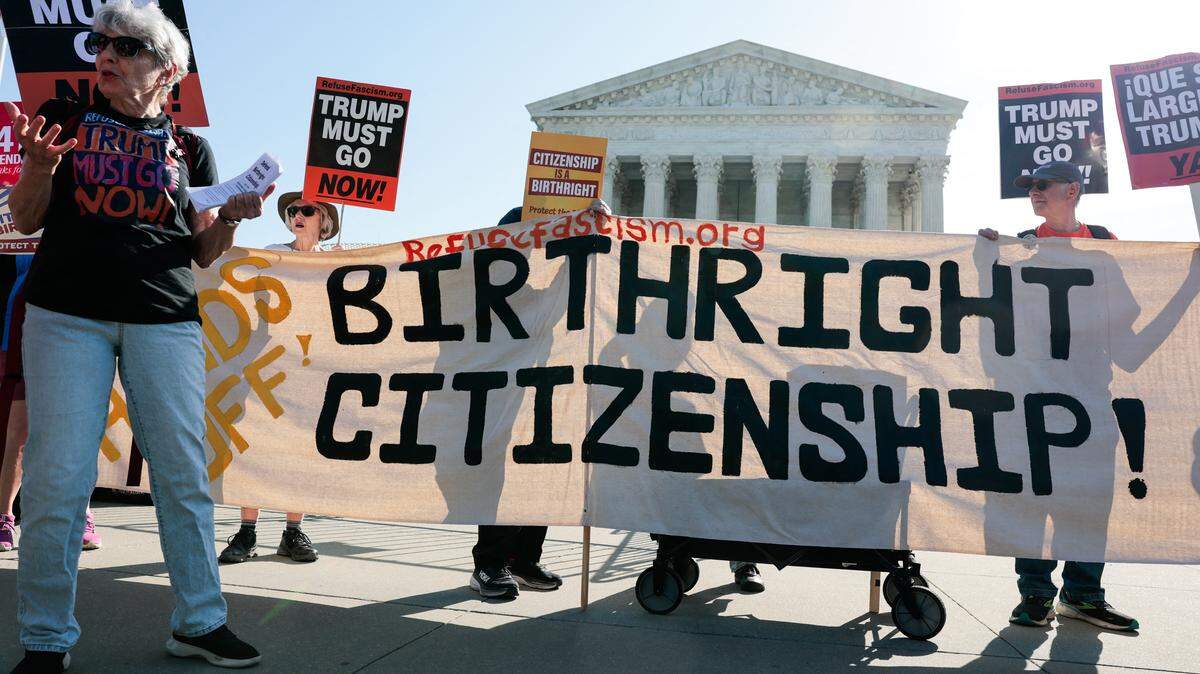 Demonstrators rally in support of birthright citizenship outside the US Supreme Court as President Donald Trump attends oral arguments in Washington, DC on April 1, 2026. President Donald Trump is watching in person as the US Supreme Court hears a landmark case weighing the constitutionality of his contentious bid to end birthright citizenship, an extraordinary and possibly unprecedented move for the nation's highest office. (Photo by Kent Nishimura / AFP via Getty Images)