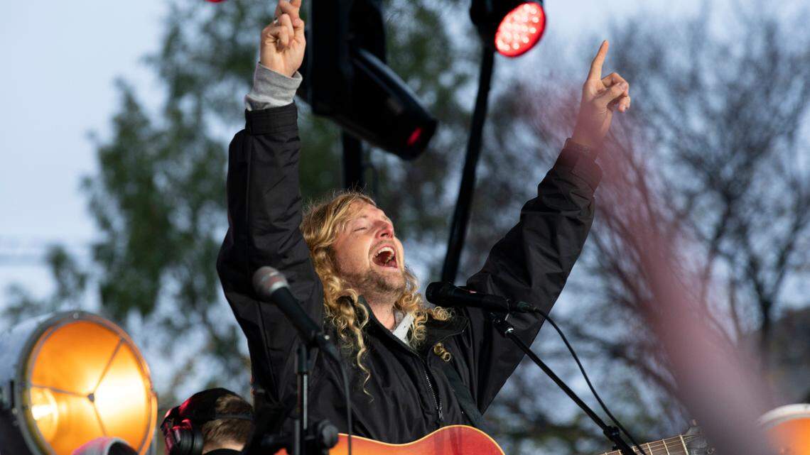 Christian musician Sean Feucht, of California, sings to the crowd during a rally at the National Mall in Washington, Sunday, Oct. 25, 2020. (AP Photo/Jose Luis Magana)