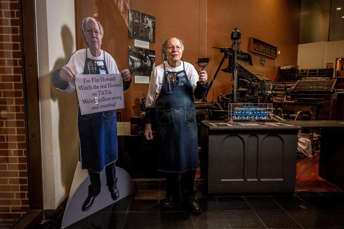 Howard Hatch holds a roller next to “Flat Howard” at the Sacramento History Museum in Old Sacramento on Friday. The humor and passion of Hatch’s printing demonstrations on social media have brought 2.8 million followers on TikTok, making it the world’s most followed museum account.