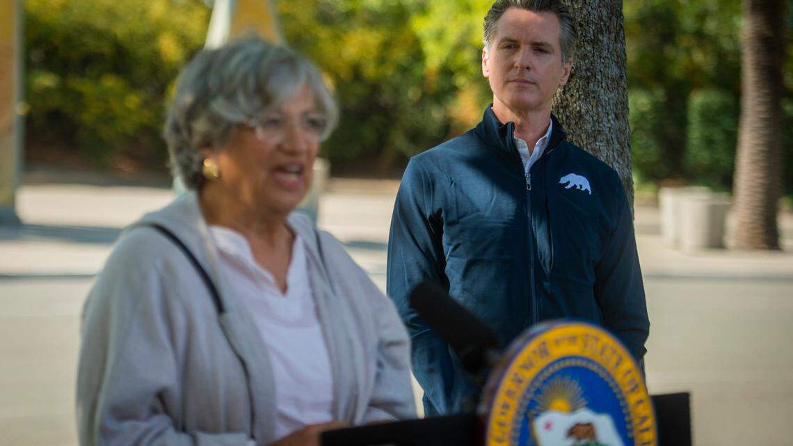 California Air Resources Board chair Mary Nichols, left, speaks at a press conference on Wednesday, Sept. 23, 2020, at Cal Expo in Sacramento, where Gov. Gavin Newsom announced an executive order requiring all new passenger vehicles sold in the state to be zero-emission by 2035, a move the governor says would achieve a significant reduction in greenhouse gas emissions.