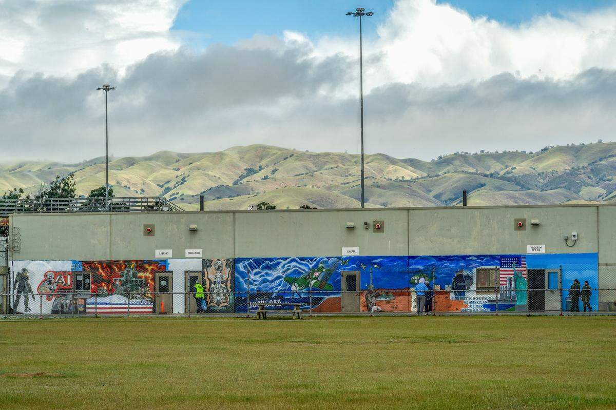 The Central Coast’s mountains, a lush green in March, are complemented by vibrant murals painted by inmates that transformed the gray buildings of Salinas Valley State Prison into a display of creativity.
