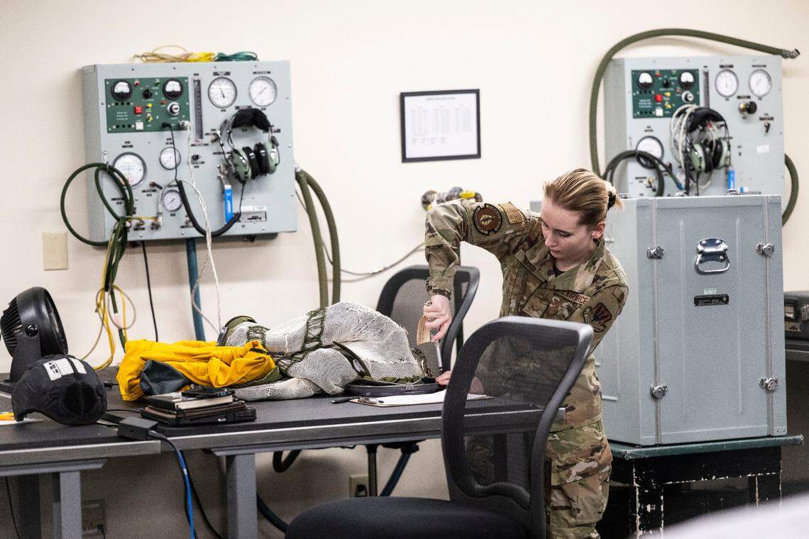 An Air Force officer works on one of the suits pilots use to fly the U-2 Dragon Lady earlier this month.