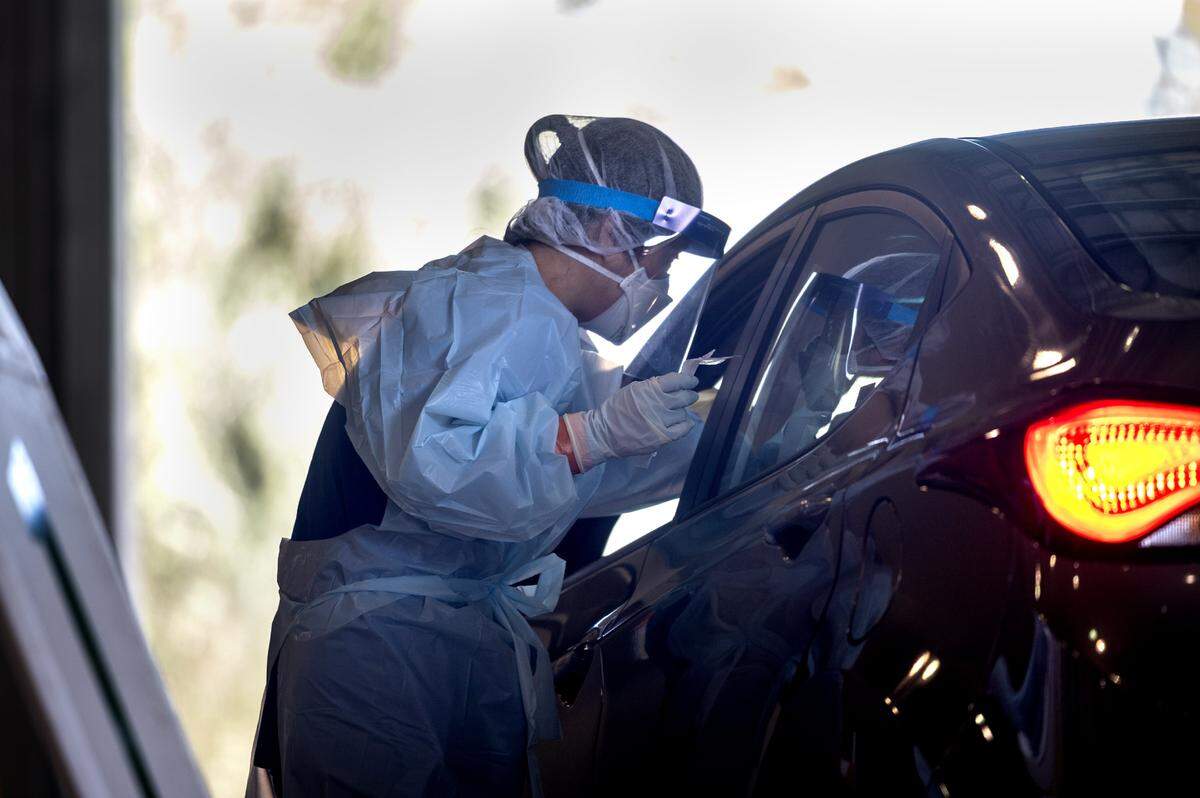 A nurse works inside the hot zone where they do coronavirus testing at Cal Expo in Sacramento on Wednesday, April 15, 2020.