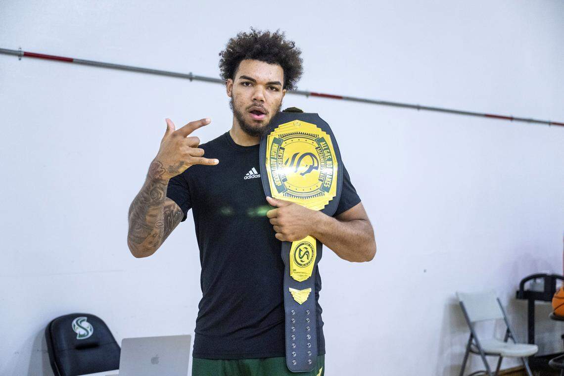 Sacramento State forward Jeremiah Cherry holds a belt after practice on Oct. 24.  