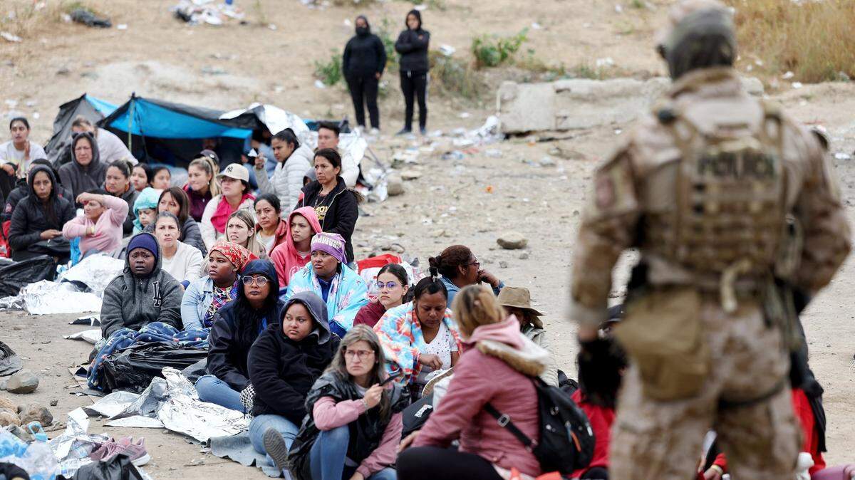 Immigrants seeking asylum in the United States are stuck in a makeshift camp between border walls between the United States and Mexico.
