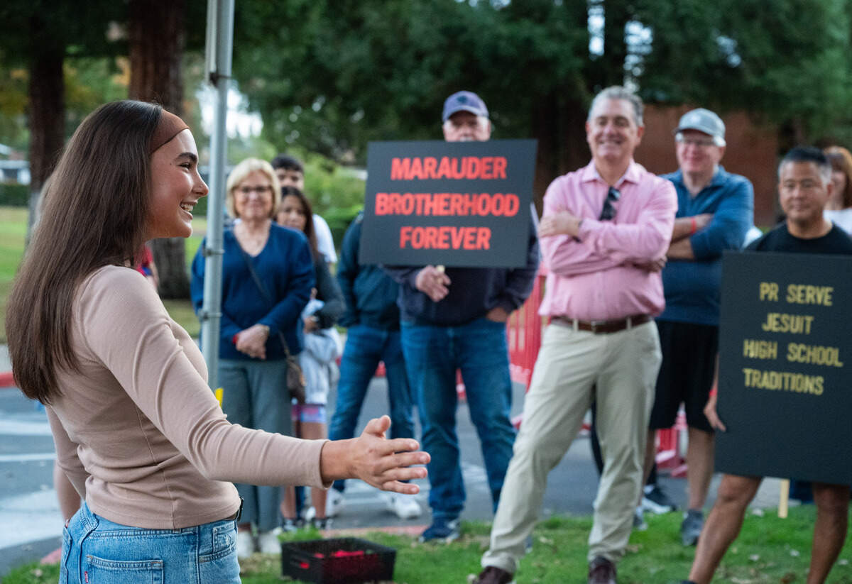 Tatum Hall, a senior at all-girls St. Francis High School, speaks Tuesday at a rally against the proposal to allow girls to attend the Carmichael high school. She said that she was speaking for boys she knew at Jesuit who were opposed to the change, but couldn’t speak for fear of expulsion. 