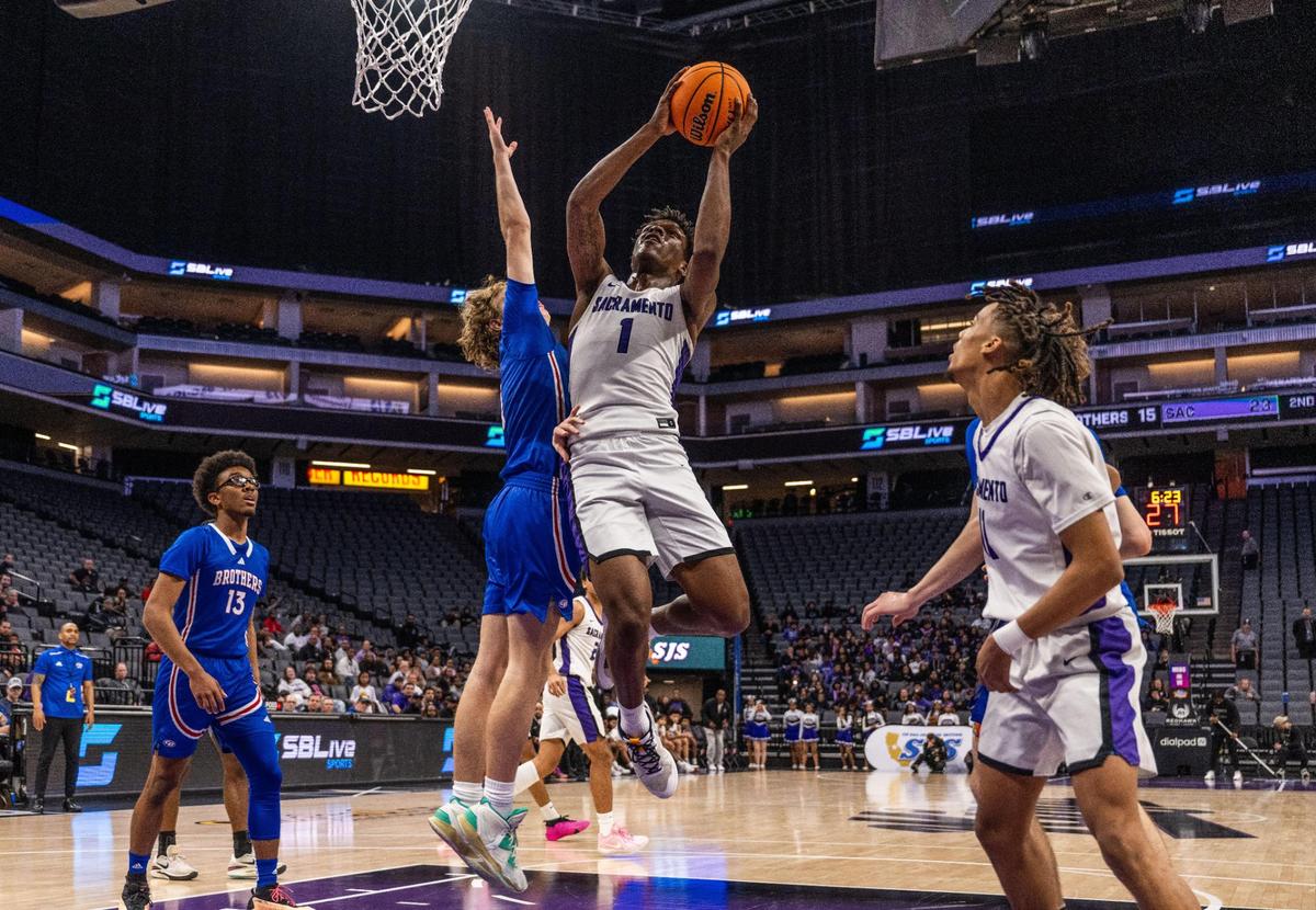 Sacramento Dragons’ Shobal Barksdale (1) goes to the basket against Christian Brothers during the CIF Sac-Joaquin Section Division III boys basketball section championship game on Wednesday at Golden 1 Center.