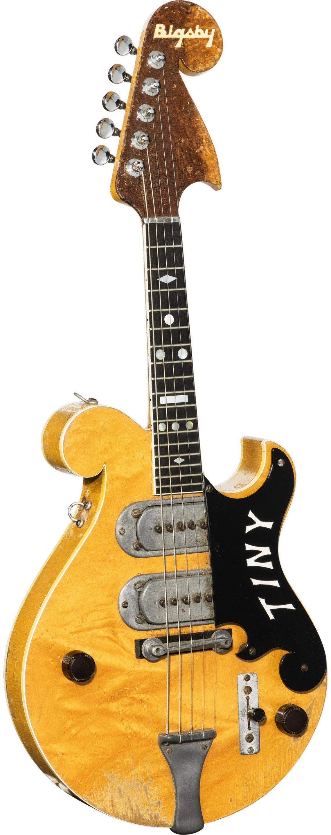 Eight instruments that once belonged to Billie “Tiny” Moore, the Port Arthur, Texas, native who played electric mandolin and fiddle with Bob Wills and the Texas Playboys in the 1940s.