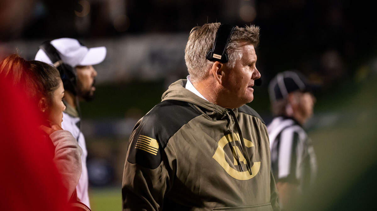 UC Davis Aggies head coach Dan Hawkins watches game action against Eastern Washington during the first half of the NCAA college football game Saturday, Nov. 13, 2021, at UC Davis Health Stadium. EWU beat UC Davis 38-20 in the Big Sky Conference game.