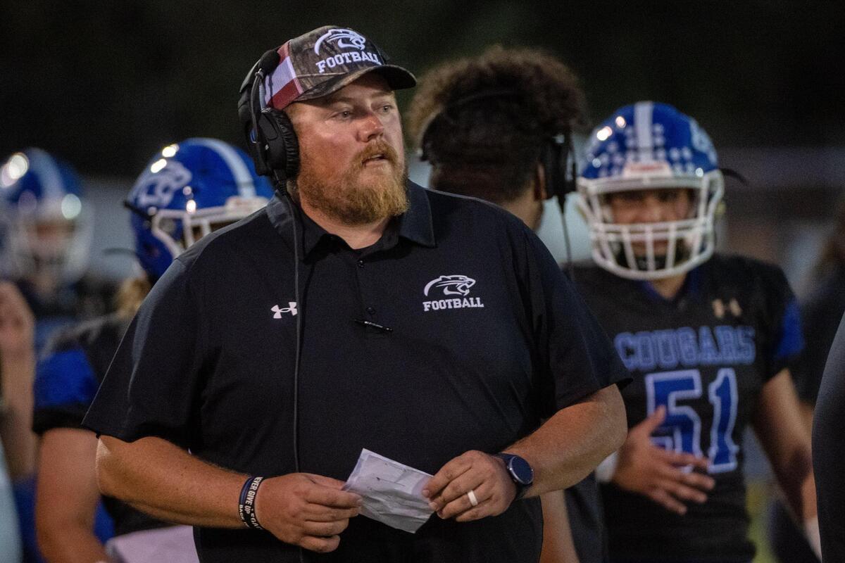 El Dorado High School football coach Kevin Placek paces the sidelines during a game against Bret Harte at El Dorado High School in Placerville, Monday, Sept. 12, 2022.