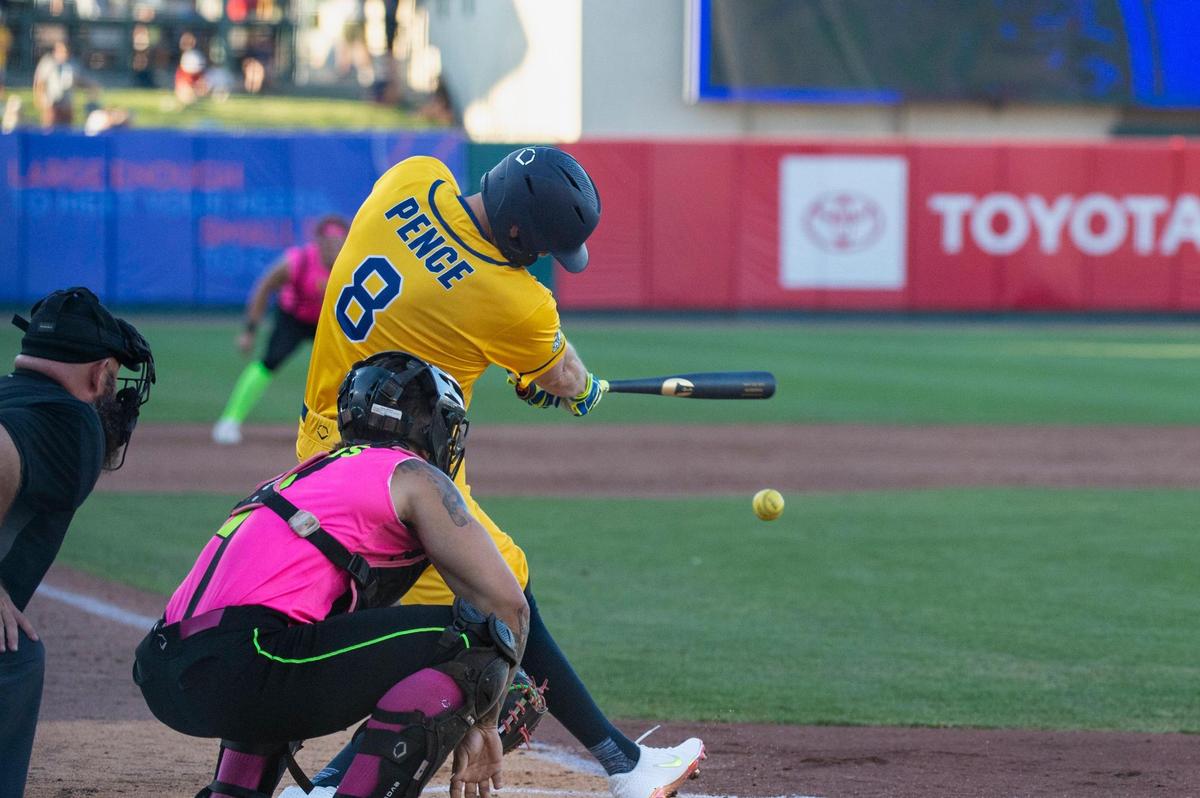 Former Giants outfielder Hunter Pence hits a grounder during the Savannah Bananas World Tour on Saturday, July 29, 2023, at Sutter Health Park in West Sacramento.