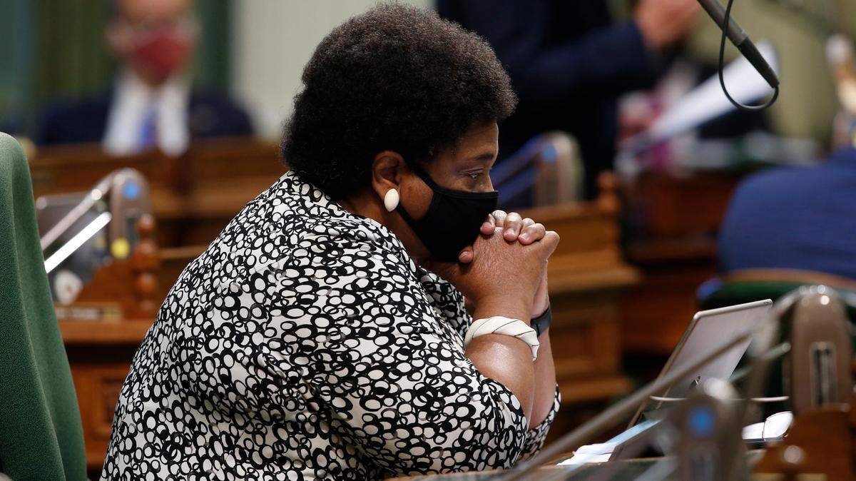 Assemblywoman Shirley Weber, D-San Diego, rests her head on her hands as she listens to lawmakers discuss her measure to place a constitutional amendment on the ballot to let voters decide if the state should overturn its ban on affirmative action programs, during the Assembly session at the Capitol in Sacramento on Wednesday, June 10, 2020. California has banned affirmative action-type programs since 1996 when 55% of voters agreed to amend the state’s Constitution to ban “preferential treatment” based on race, sex, color, ethnicity or national origin.