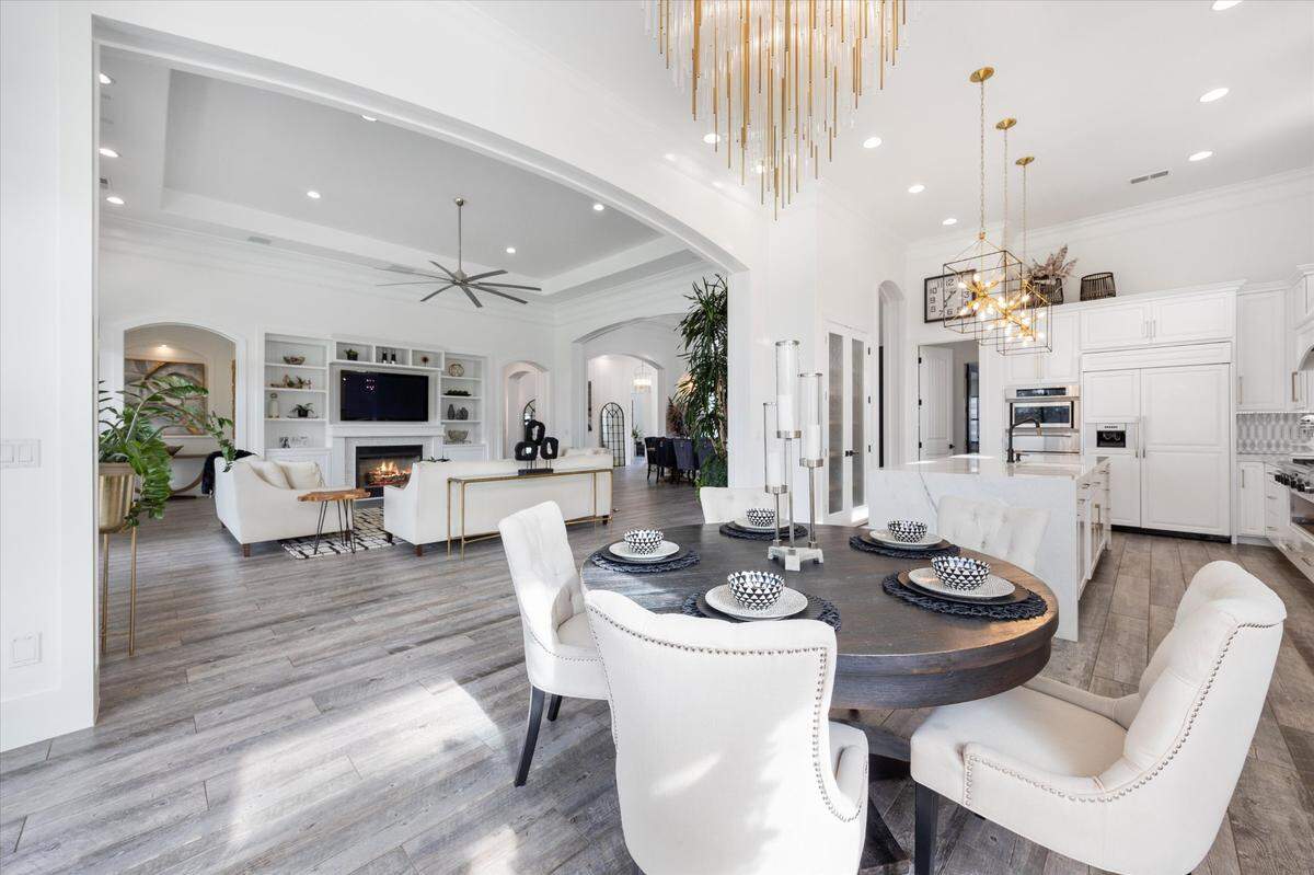 The waterfront home spans 5,000 square feet with an open-concept floor plan.