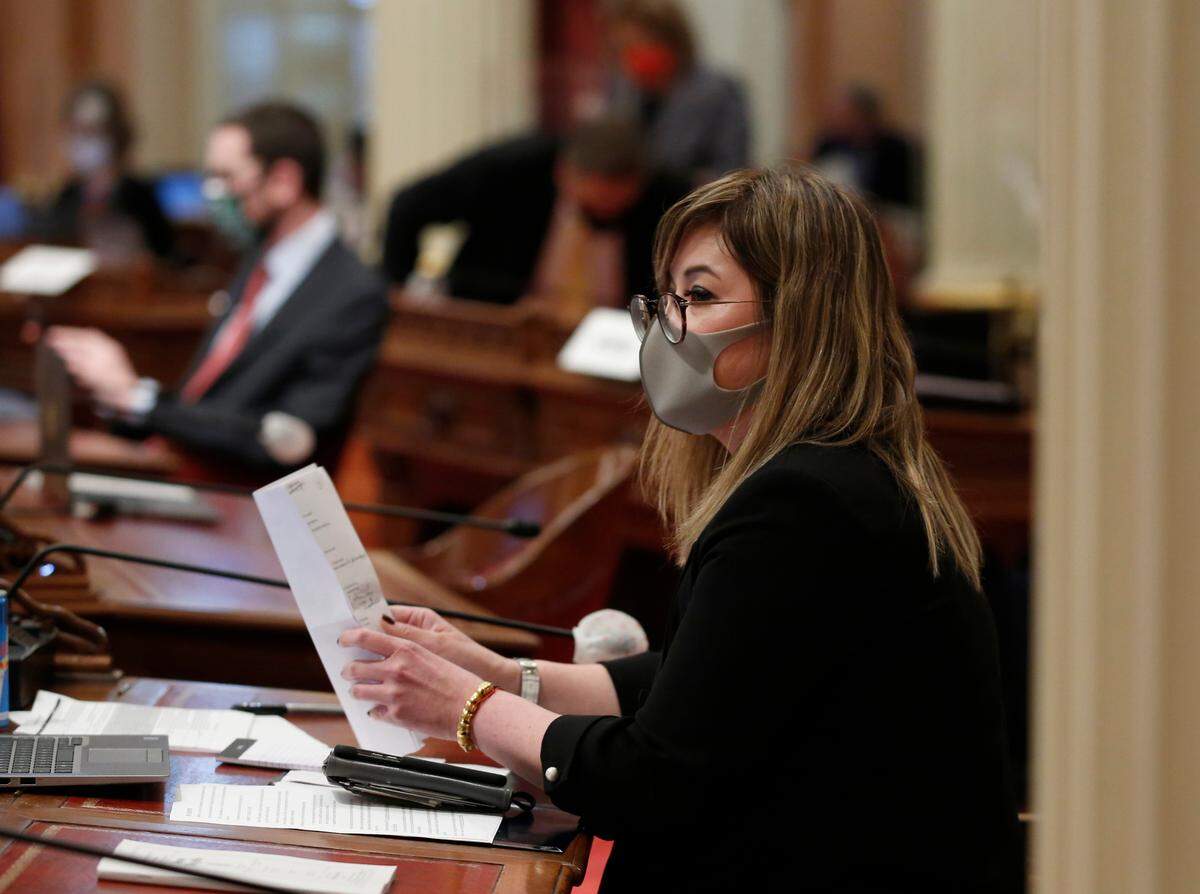 State Sen. Ling Ling Chang, R-Diamond Bar, listens as lawmakers debate a measure to place a proposed Constitutional amendment on the November ballot to overturn its ban on affirmative action programs, at the Capitol, in Sacramento on Wednesday, June 24, 2020. By a 30-10 vote the Senate approved the measure to let voters decide whether to repeal a ban on affirmative action policies in government and public colleges and universities. Chang joined other Republican members in voting against the measure.