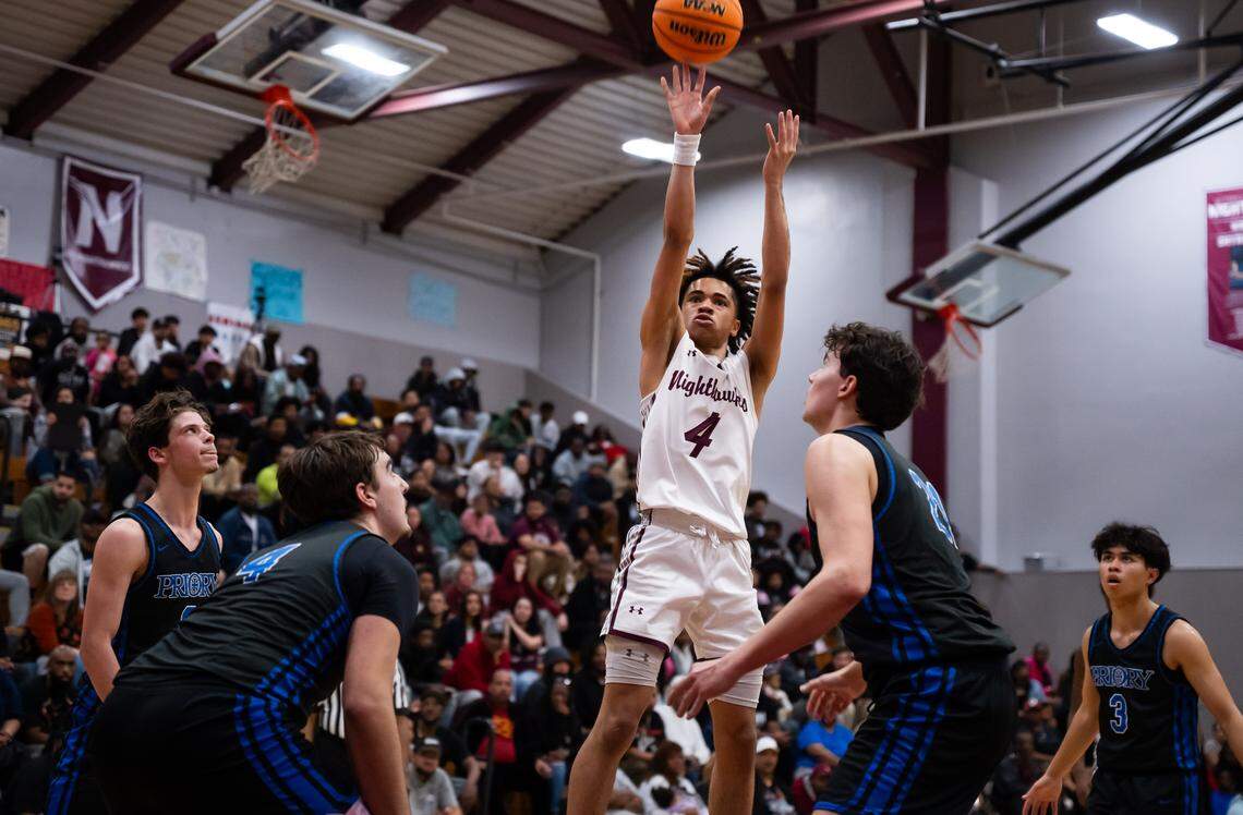 Natomas Nighthawks guard Manno Jenkins (4) makes a shot in the fourth quarter against the Priory Panthers in the CIF Northern California Division III boys basketball regional semifinal on Saturday.