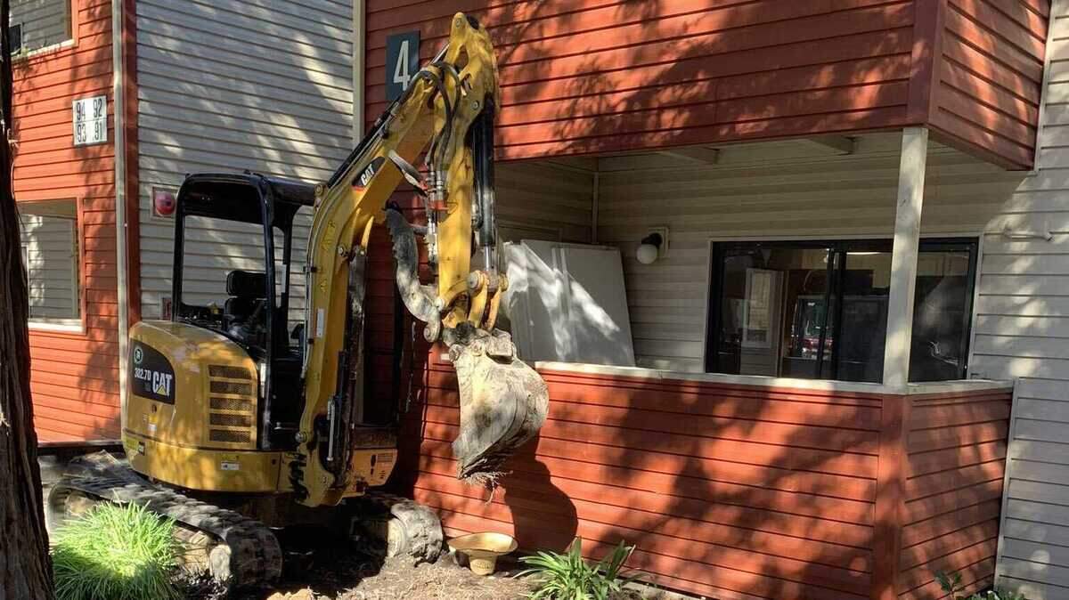 Firefighters on Wednesday Feb. 16, 2022, rescued an injured worker trapped between an excavator and a building in the 4400 block of Elkhorn Boulevard in North Highlands, California.