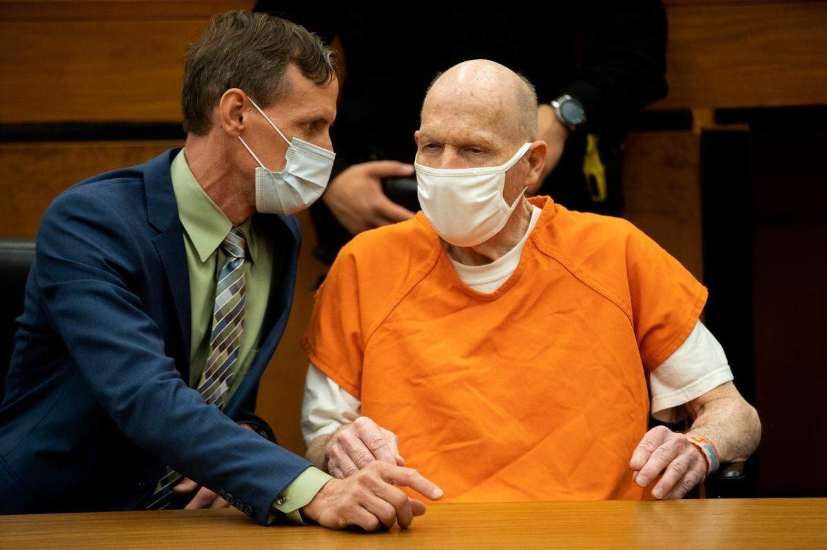 Joseph James DeAngelo, right, and public defender Joseph Cress consult during the first day of victim impact statements at the Gordon D. Schaber Sacramento County Courthouse on Tuesday, Aug. 18, 2020, in Sacramento. DeAngelo, the infamous Golden State Killer, has admitted to more than 50 rapes.