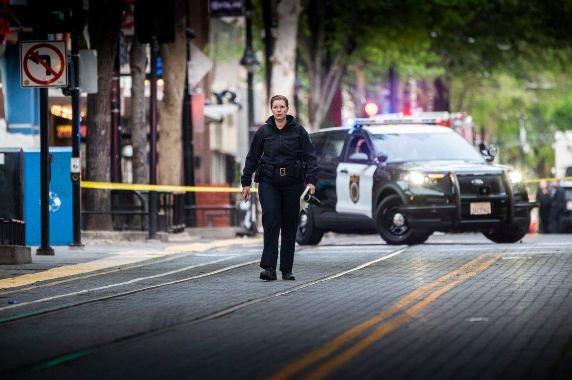 Sacramento Police Chief Kathy Lester walks the scene of the mass shooting in downtown Sacramento on Sunday, April 3, 2022.