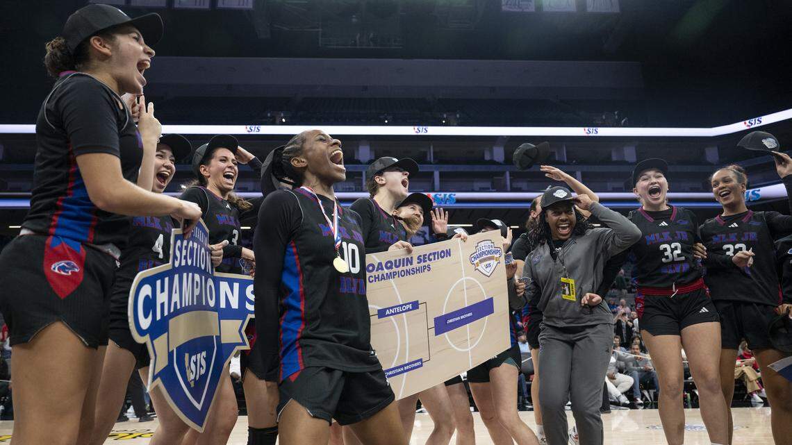 The Christian Brothers girls basketball team celebrates winning the CIF Sac-Joaquin Section Division II girls basketball championship at Golden 1 Center in Sacramento on Friday.