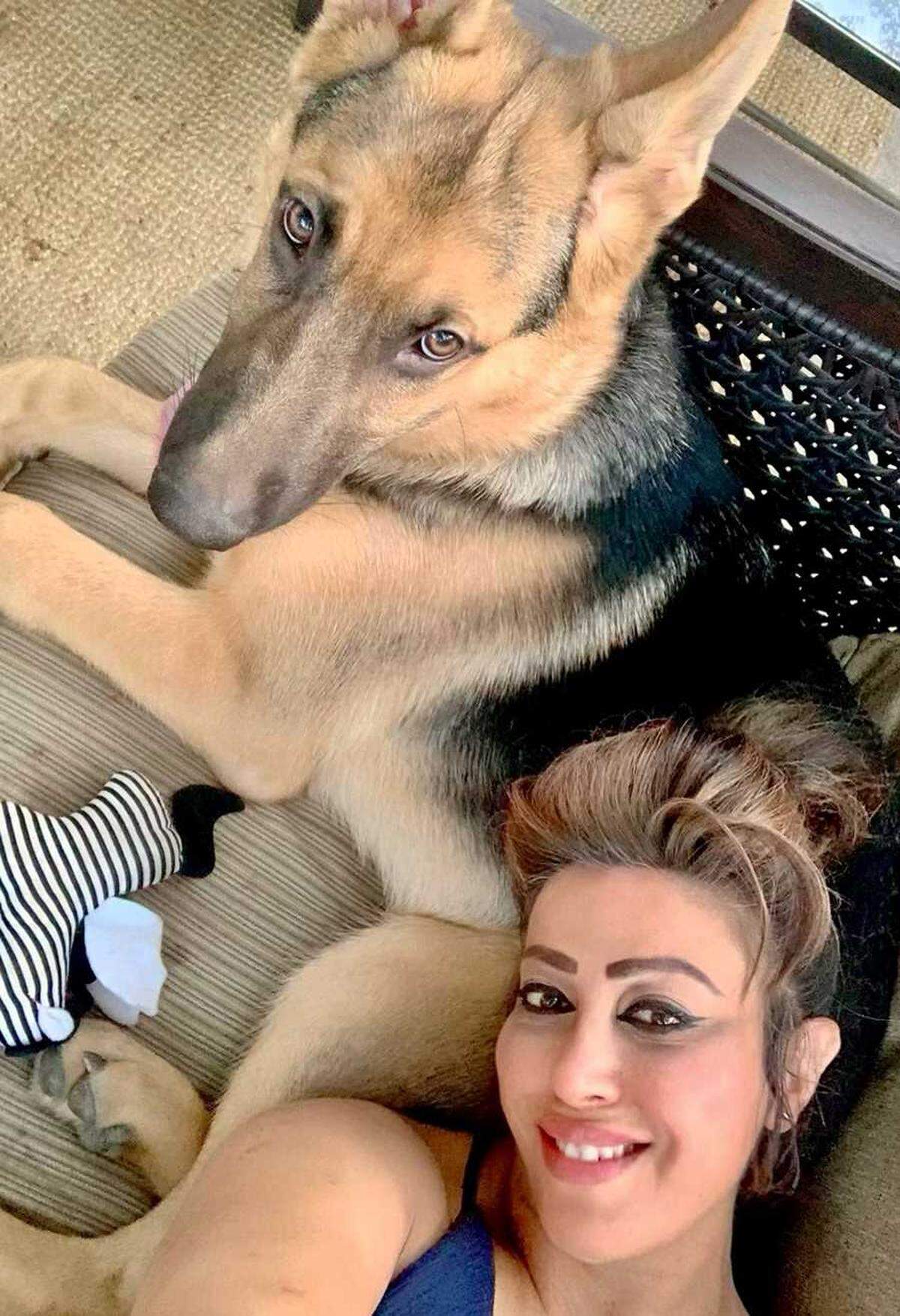 Faryal Kabir is seen in an undated photo with her dog, Zeus. She is suing to stop Elk Grove from killing her German shepherd dog, who gave minor bites to two people including a police officer.