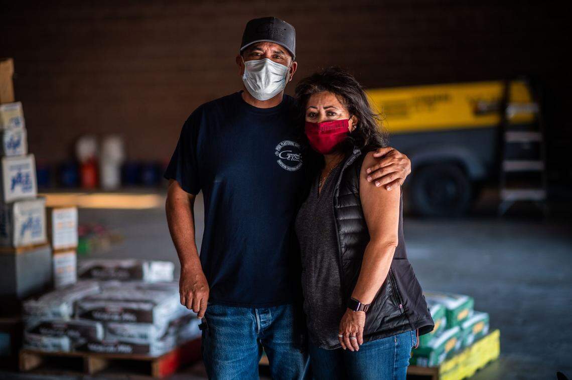 Valentino Rodriguez Sr. and his wife Erma Rodriguez stand in their West Sacramento business on Tuesday, April 6, 2021. Their son, former correctional officer Valentino Rodriguez Jr., was found dead dead at home in October. The death of Rodriguez Jr., who left his job at California State Prison-Sacramento in Folsom after suffering harassment from other officers, was ruled accidental Wednesday.