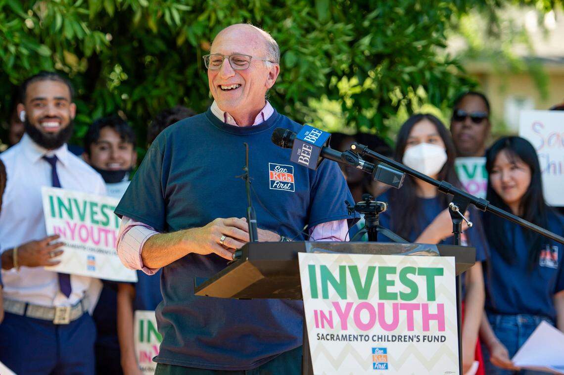 Councilmember Jay Schenirer laughs after telling a joke at the press conference for Sac Kids First on Monday at Mack Road Valley Hi Community Center in Sacramento. City leaders announced a new initiative to establish a children’s fund for the City of Sacramento through a measure to be placed on the November 2022 ballot.