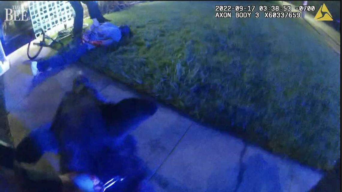 An image taken from bodyworn video, suspect Salvador Garcia Jr. is seen on the ground after being subdued by a Sacramento County Sheriff’s Office K-9 at the Cypress Village Apartment Complex on Marconi Avenue in Arden Arcade on Sept. 17, 2022. Garcia is suing the county over his treatment by the dog and deputies.