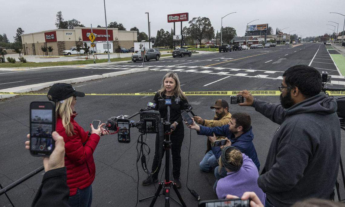 San Joaquin Sheriff’s Office spokesperson Heather Brent gives an update on Sunday at the site of a mass shooting near Stockton. Brent said four were killed and 11 were injured in the shooting outside a child's birthday party.