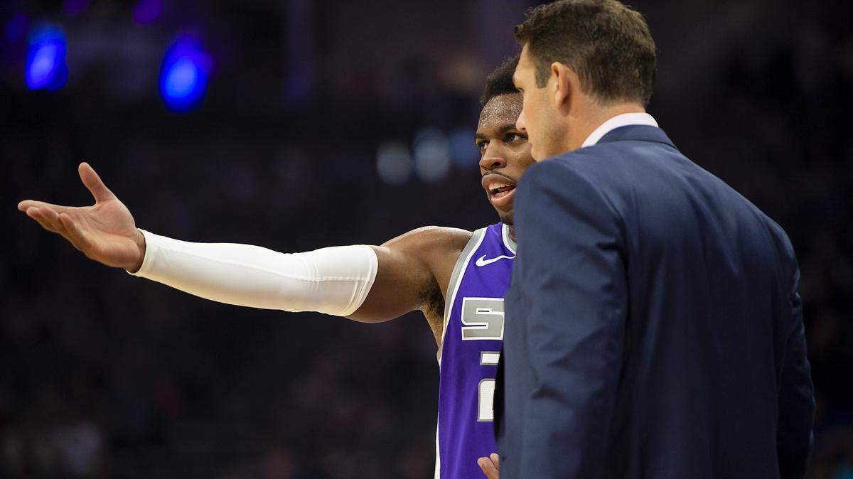 Sacramento Kings guard Buddy Hield (24) talks with Sacramento Kings coach Luke Walton during a game at Golden 1 Center on Monday, October 28, 2019 in Sacramento.