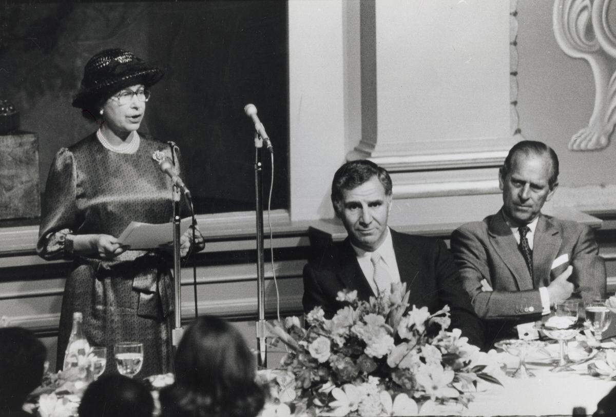 Queen Elizabeth II speaks at a luncheon gathering at the state Capitol as Gov. George Deukmejian and Prince Philip listen on March 4, 1983.