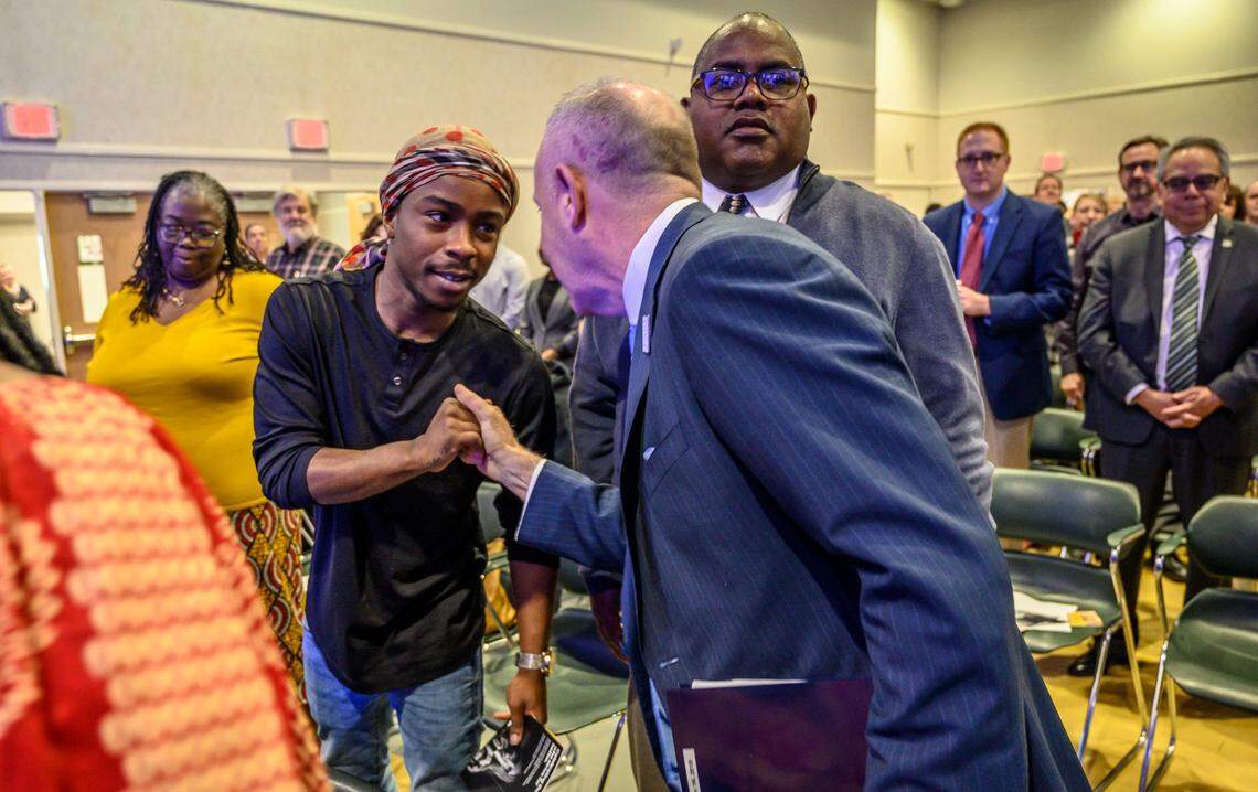 Stevante Clark, whose brother Stephon Clark was killed by Sacramento police officers in 2018, is greeted by Sacramento Mayor Darrell Steinberg before his State of the City address on Feb. 19, 2019, at the Sam & Bonnie Pannell Community Center in Sacramento.