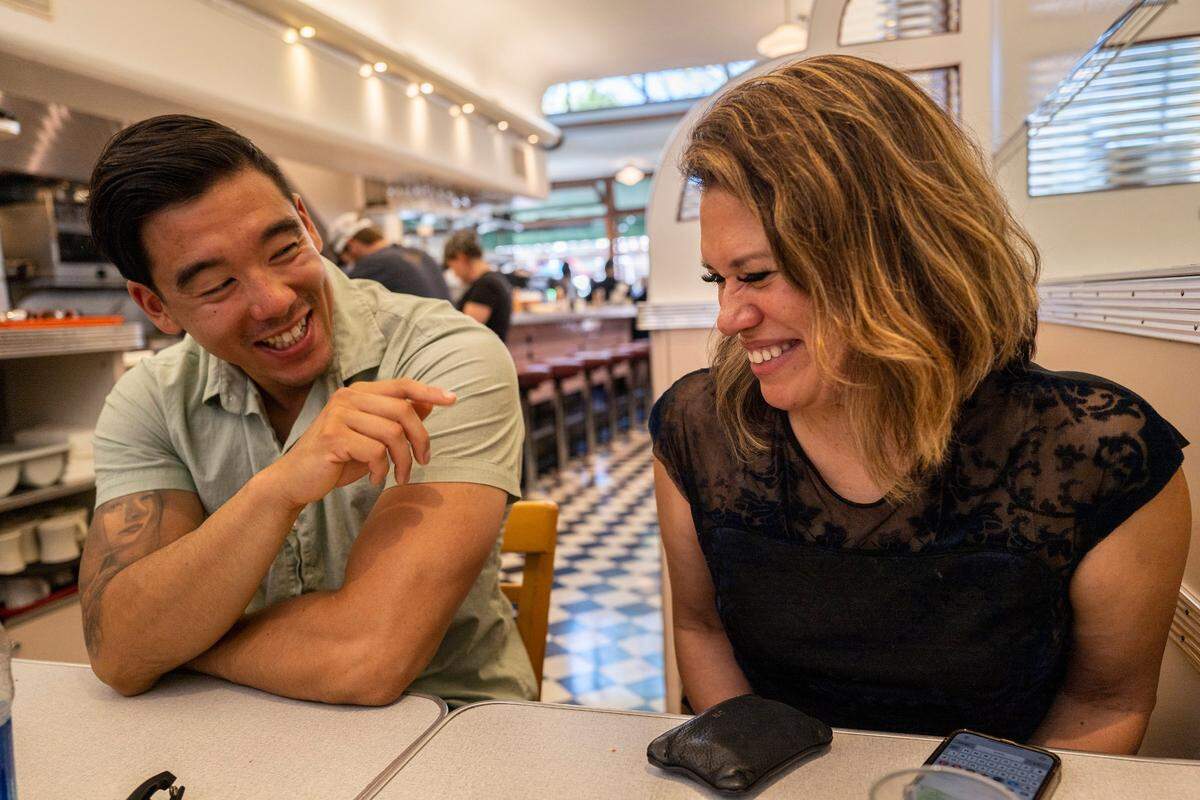 Norma Cumpian and her son Anthony Cumpian, 29, share a laugh at Oceanview Dinner during a lunch in Berkeley earlier this month. “When I became pregnant with my son, I thought this is something that is the light at the end of the tunnel, something that was good,” said Norma, who was in an abusive relationship with Anthony’s father at the time.