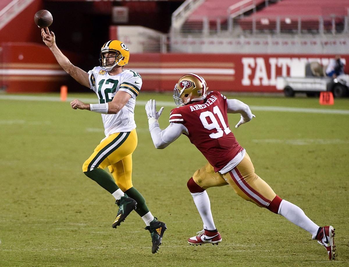 San Francisco 49ers defensive end Arik Armstead (91) pressures Green Bay Packers quarterback Aaron Rodgers (12) in the third quarter during a game at Levi’s Stadium in November in Santa Clara.