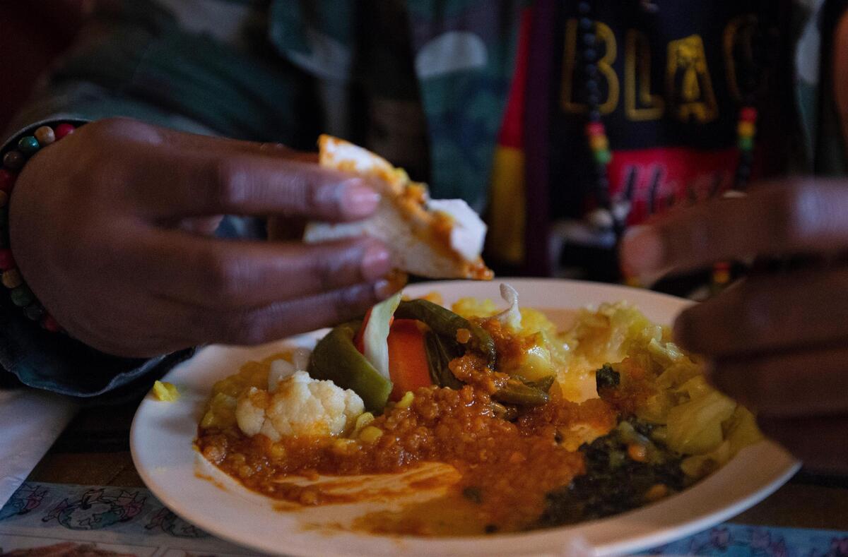 Injera Bread and Vegetarian Combo Plate served at  Queen Sheba on Broadway.