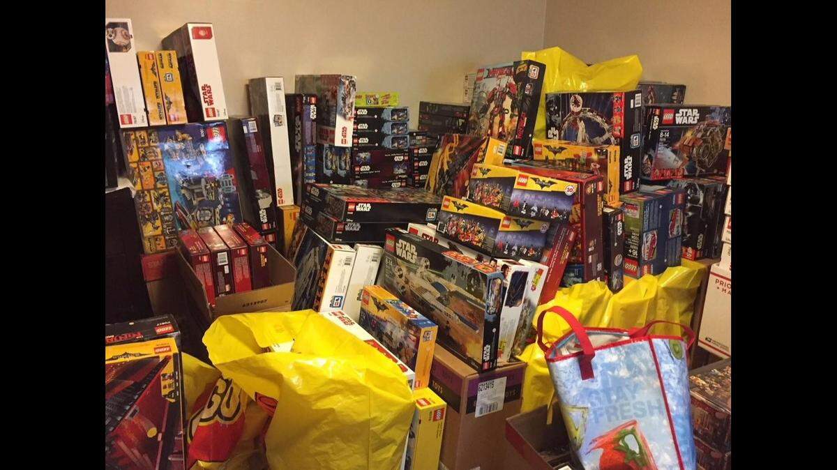 Portland, Ore., police say they found more than $50,000 in stolen Legos and other toys in the home of Raji Afife Azar, 40, accused of masterminding a fencing ring that stole and resold the blocks online.