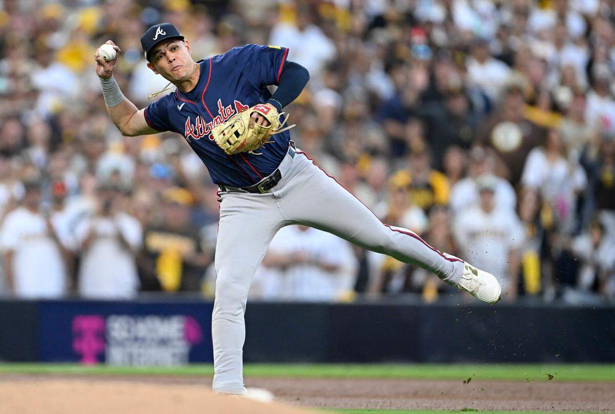 Atlanta Braves third baseman Gio Urshela (9) throws to first during the second inning of game two in the Wildcard round for the 2024 MLB Playoffs against the San Diego Padres at Petco Park on Oct 2, 2024 in San Diego. Urshela now plays for the Athletics after signing as a free agent.