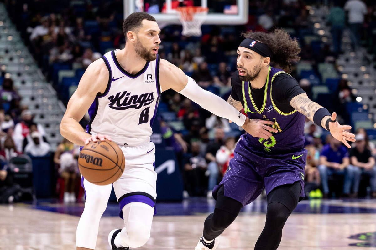 Sacramento Kings guard Zach LaVine (8) dribbles against New Orleans Pelicans guard Jose Alvarado (15) during the first half Wednesday, Feb. 12, 2025, at Smoothie King Center in New Orleans, Louisiana.