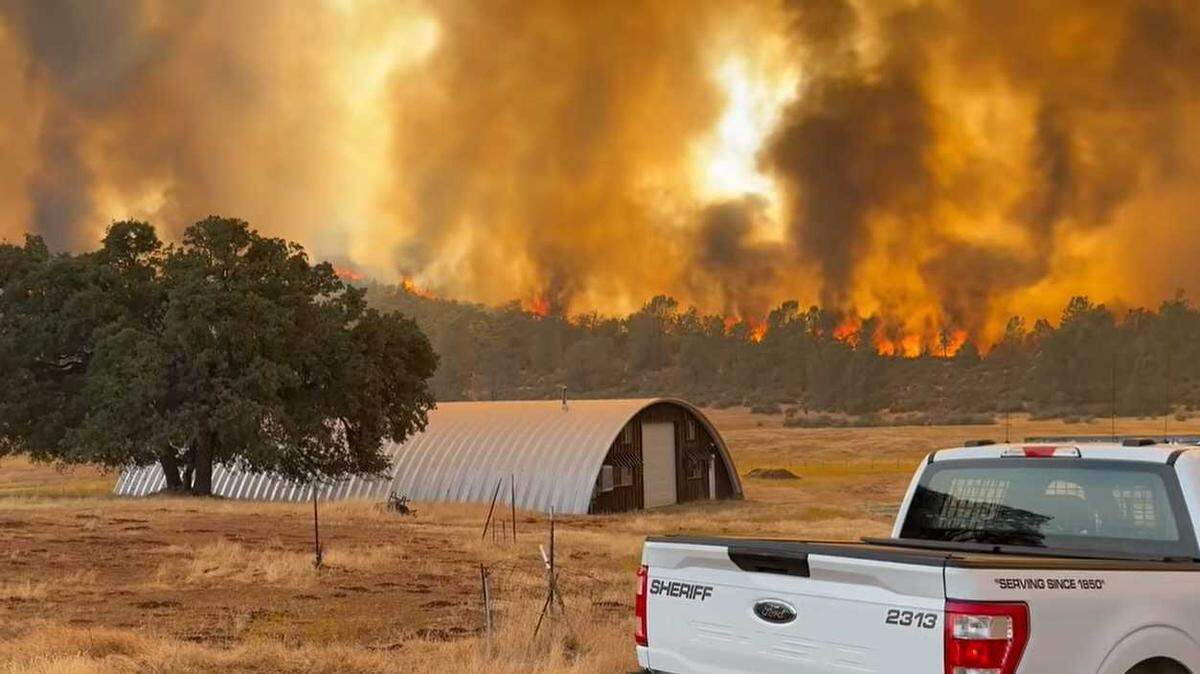 Flames from the 6-5 Fire, one of several wildfires sparked during a lightning storm in Tuolumne and Calaveras counties, is seen in September. 