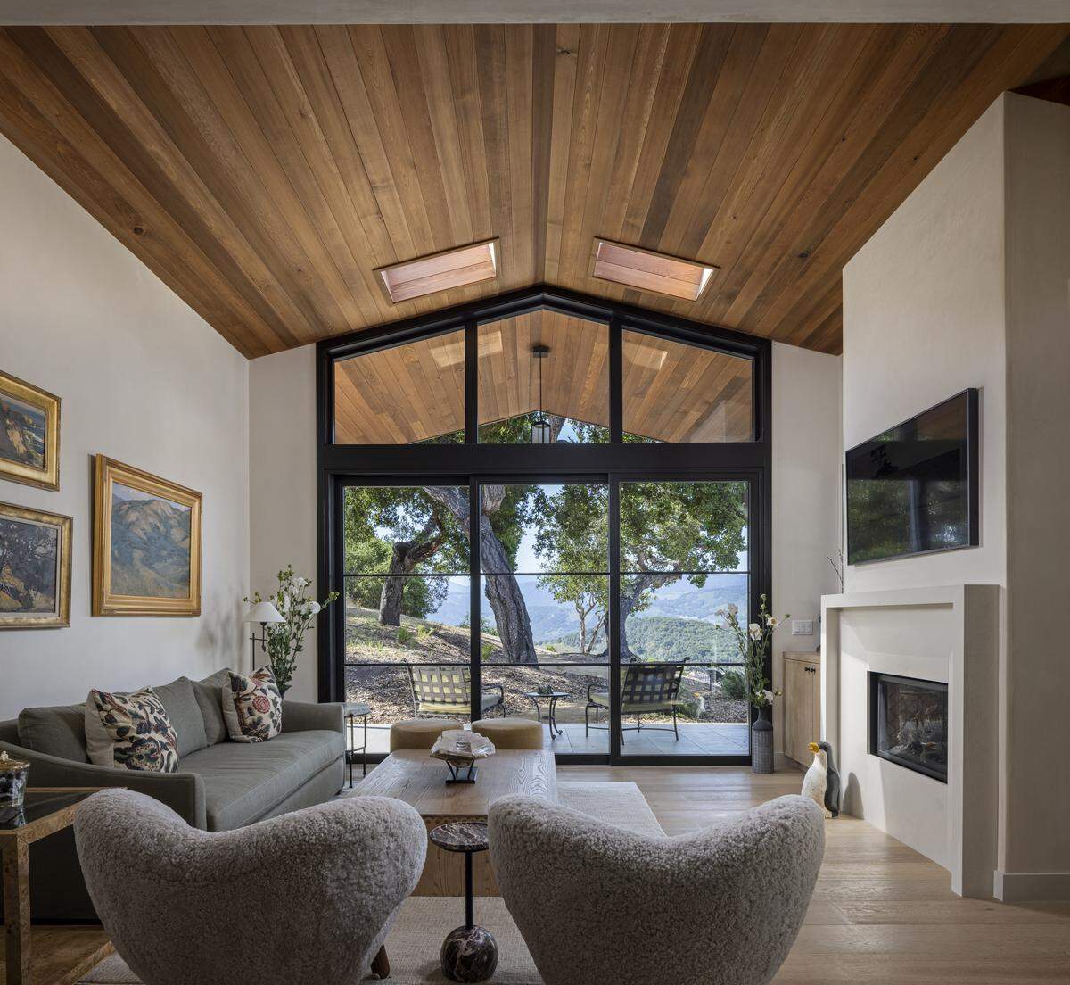 Radiant-heated hardwood floors, a stone-clad fireplace and skylit ceilings flow out to firepit terraces and a pool, turning this 12.32-acre Tehama estate into a private resort.