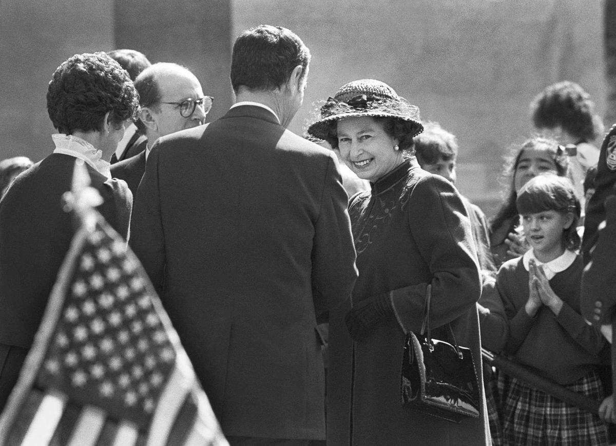 Queen Elizabeth is greeted by California Gov. George Deukmejian outside the State Capitol on Friday, February 4, 1983 in Sacramento.