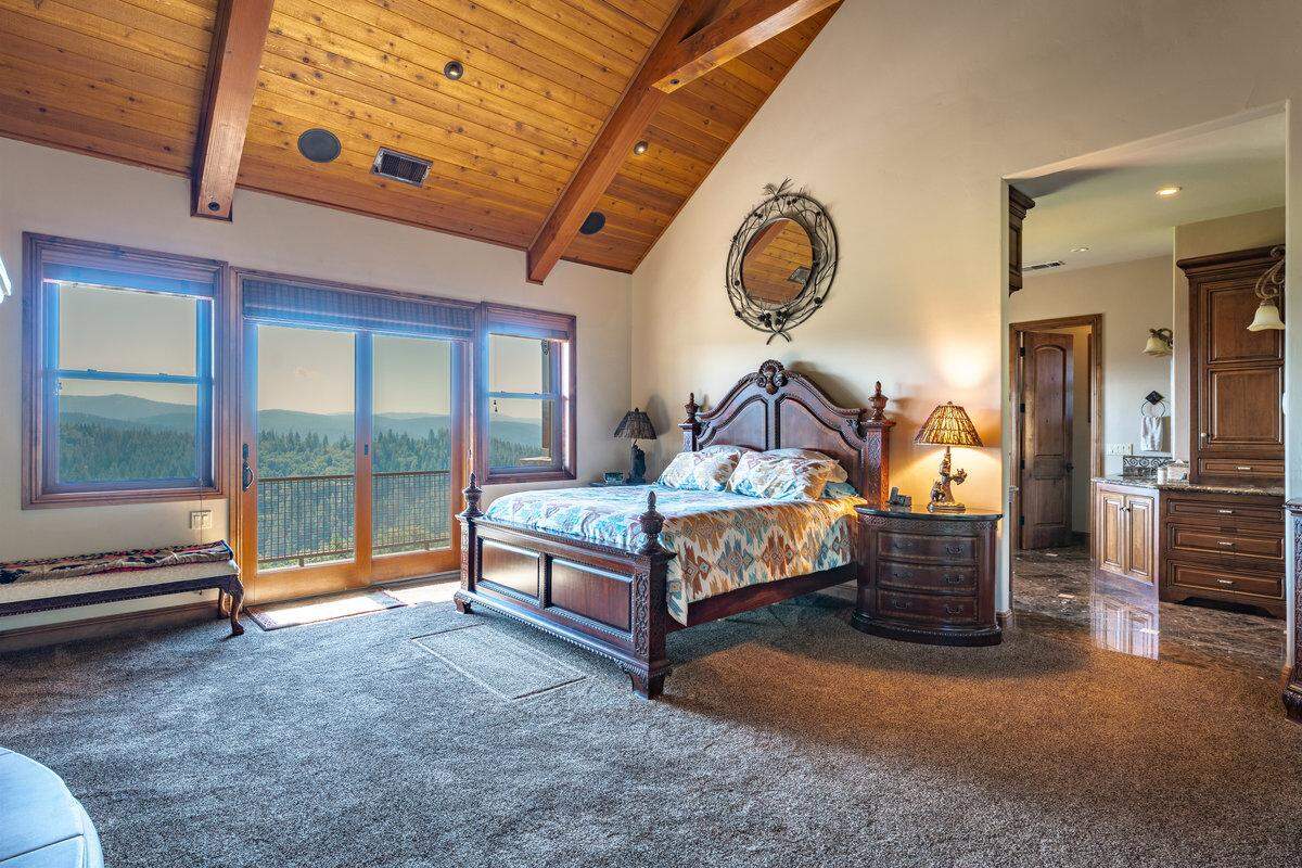 The views from the primary bedroom, one of a total of five bedrooms on the property, are stunning.