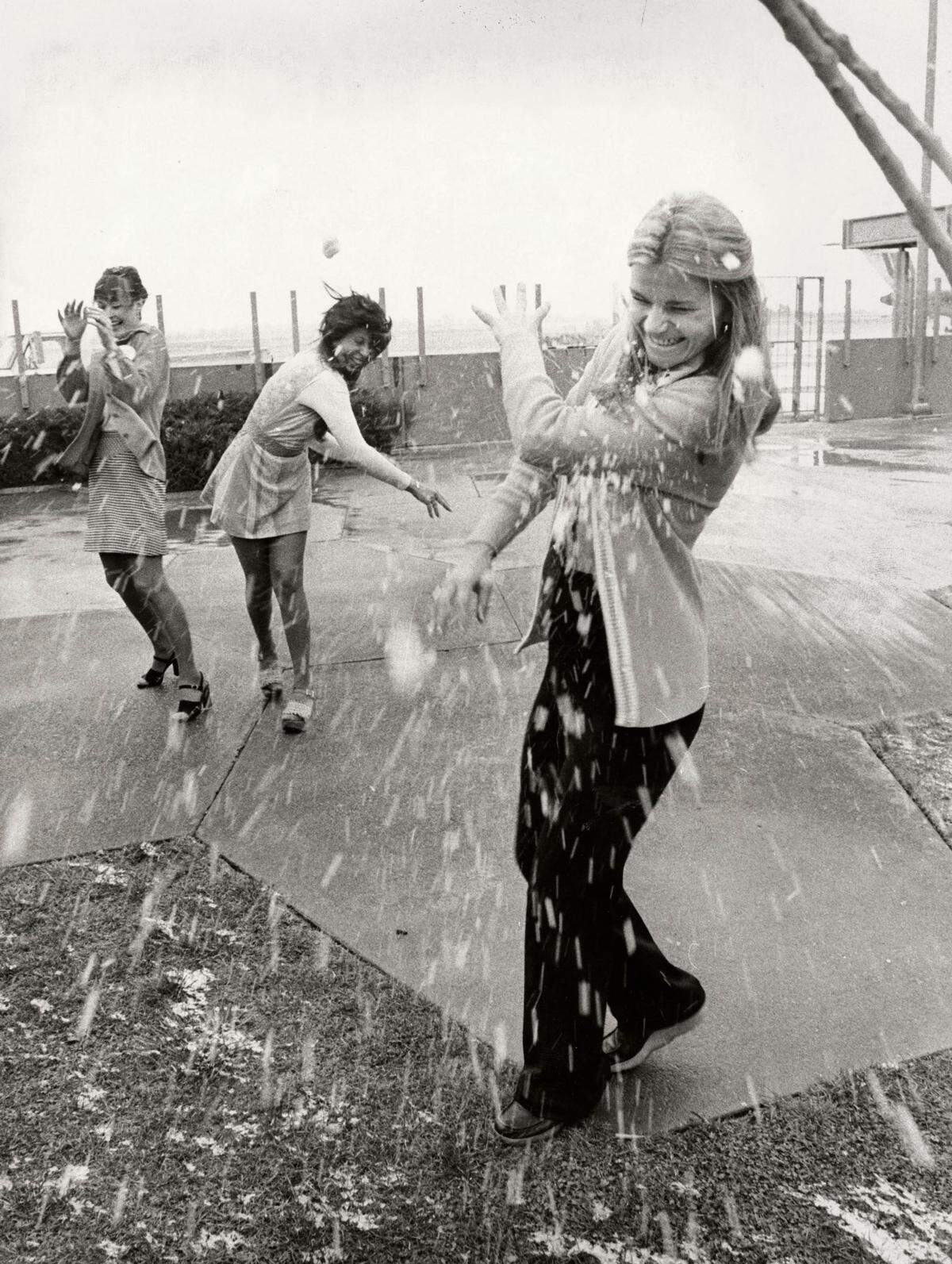 Inge Gough, Maggie Gomez and Sherry McAtee enjoy a battle during the snow on Feb. 5, 1976, in Sacramento.
