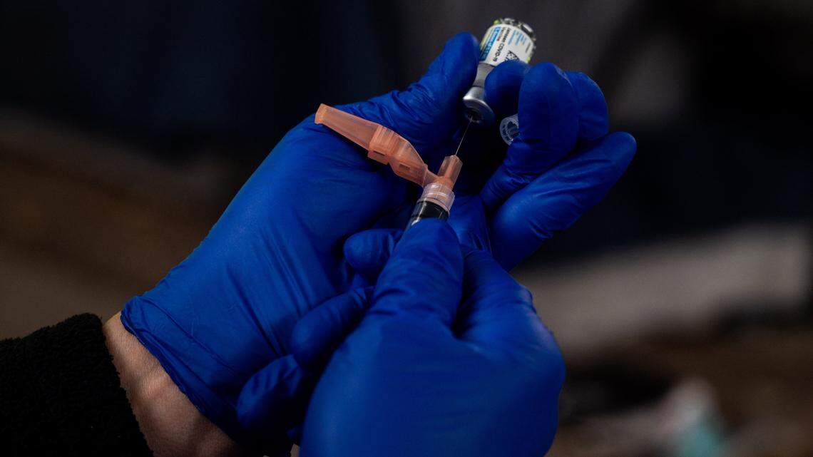A syringe is filled with the single-shot Johnson & Johnson COVID-19 vaccine in Sacramento on Thursday, March 18, 2021.