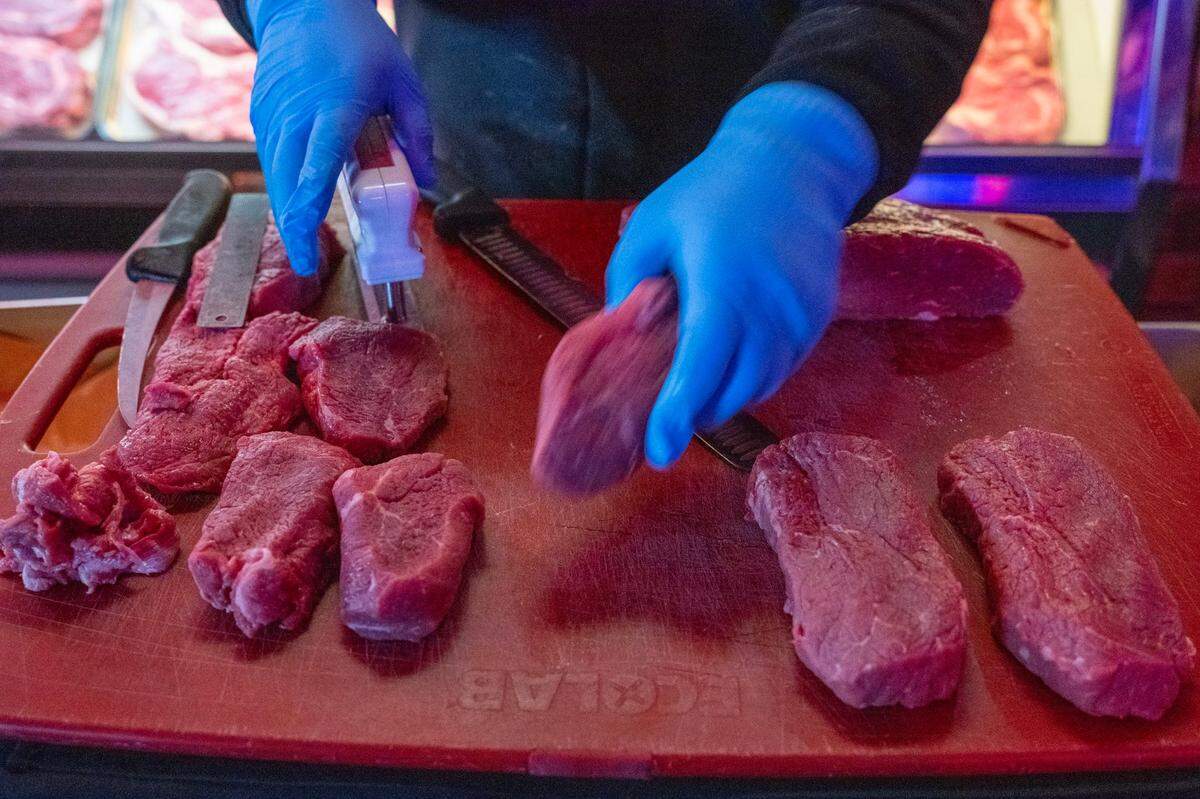 Butcher Oscar Soto prepares cuts of sirloin steak at Texas Roadhouse on Feb. 2 in Elk Grove. He is competing in the annual company meat-cutting challenge for Texas Roadhouse.