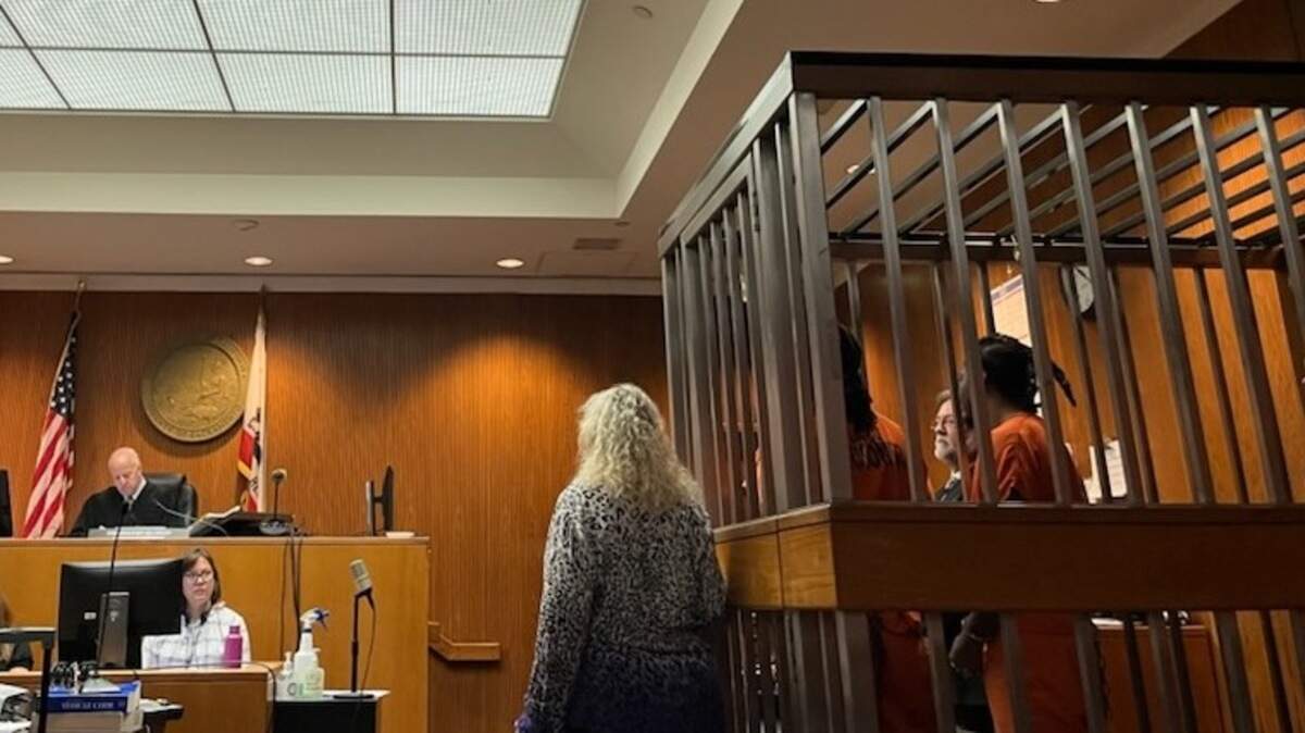 Smiley Martin, 27, and Dandrae Martin, 26, appear in court on June 21, 2022. The brothers are charged alongside Mtula Payton, 28, in connection to an April gang shootout that injured 12 and killed 6.
