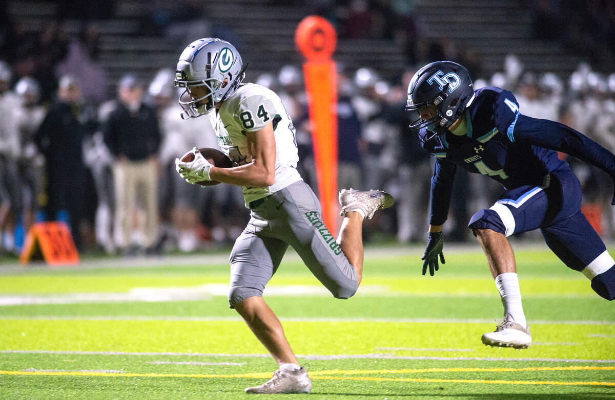 Granite Bay’s Joseph Cattolico makes a touchdown catch during the CIF Sac-Joaquin Section Division II playoff game with Downey at Downey High School in Modesto, Calif., Friday, Nov.11, 2022.