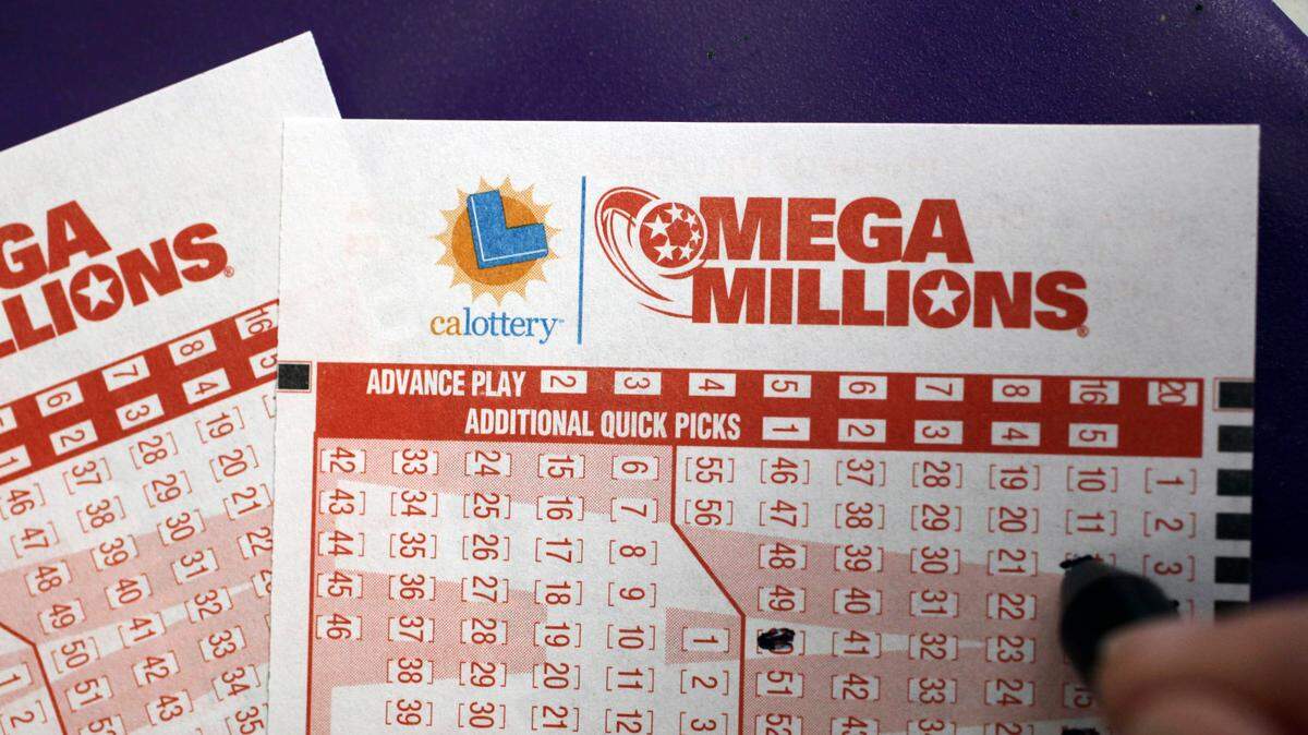 A customer fills out a lottery ticket in Palo Alto, Calif., Friday, March 30, 2012 in hopes to win at least $640 million in the Mega Millions lottery. (AP Photo/Paul Sakuma)