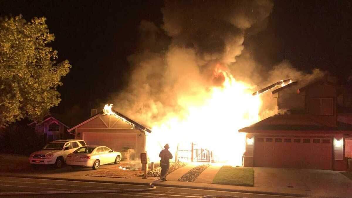 A two-alarm fire burned two homes early Thursday morning Aug. 11, 2022, in the 6900 block of Seasons Drive in Elk Grove, California.